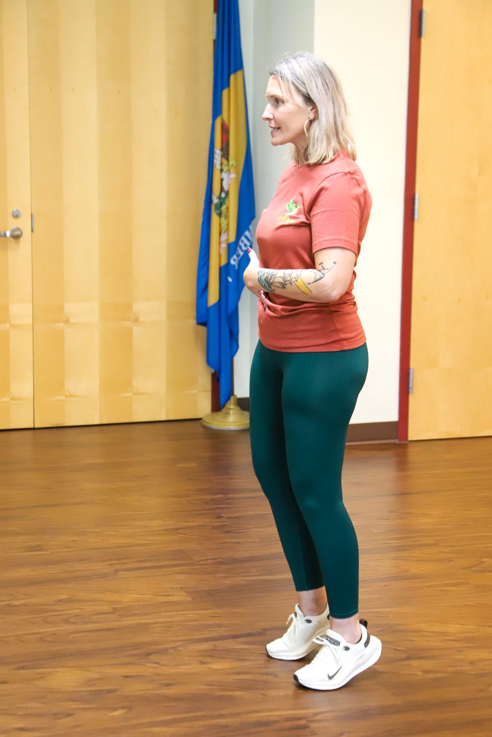 A Rooted in Strength Pilates instructor leading a community class in Seaford, DE